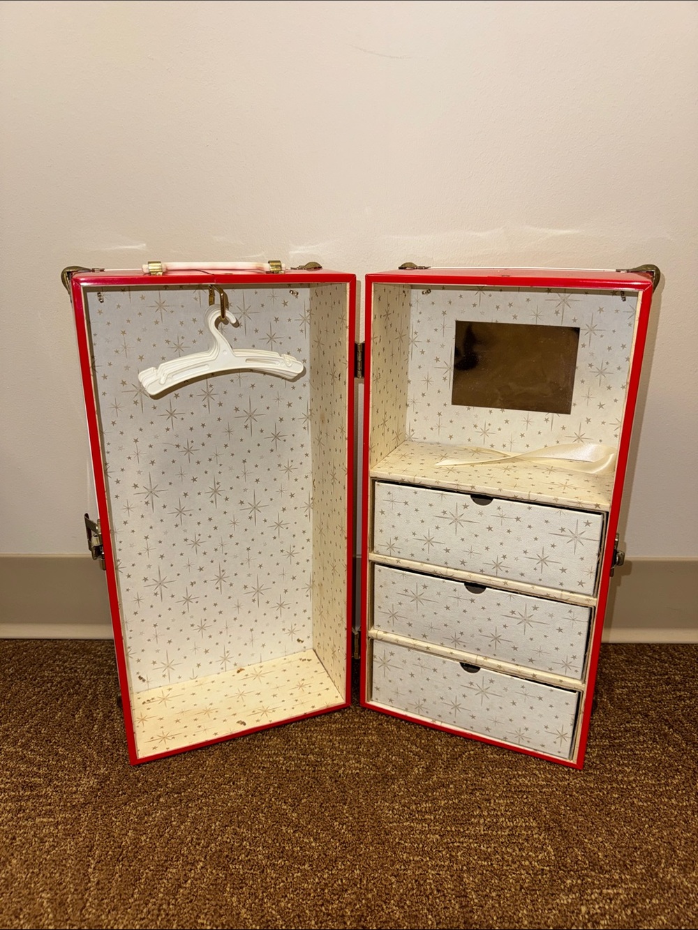 Vintage Red Portable Storage Trunk with Star-Patterned Interior